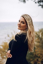 Ukrainian mail order bride Anna from Kyiv with blonde hair and green eye color - image 7