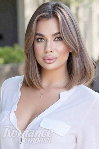 Ukrainian mail order bride Sofiia from Kyiv with light brown hair and green eye color - image 1