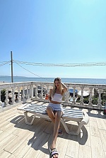 Ukrainian mail order bride Olha from Odesa with blonde hair and green eye color - image 2