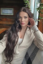 Ukrainian mail order bride Anastasia from London with light brown hair and green eye color - image 4