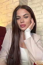 Ukrainian mail order bride Anastasia from London with light brown hair and green eye color - image 5