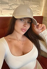 Ukrainian mail order bride Anastasia from London with light brown hair and green eye color - image 7