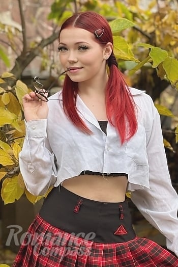 Ukrainian mail order bride Diana from Ivano-Frankivsk with red hair and green eye color - image 1