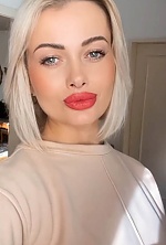 Ukrainian mail order bride Halina from Vienna with blonde hair and blue eye color - image 21