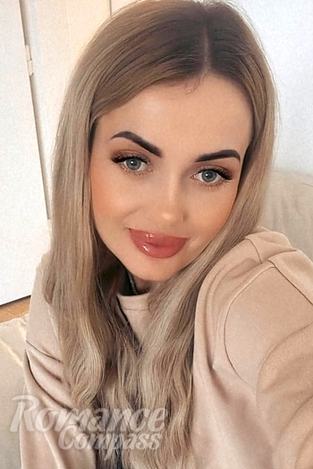 Ukrainian mail order bride Halina from Vienna with blonde hair and blue eye color - image 1