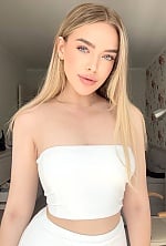 Ukrainian mail order bride Yana from Kyiv with blonde hair and blue eye color - image 8