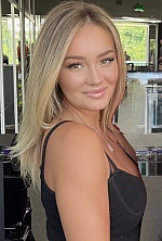 Ukrainian mail order bride Iulia from Chisinau with blonde hair and hazel eye color - image 5