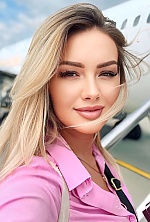 Ukrainian mail order bride Iulia from Chisinau with blonde hair and hazel eye color - image 7