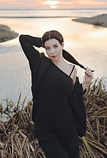 Ukrainian mail order bride Yuliya from Kyiv with black hair and blue eye color - image 5