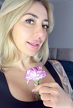 Ukrainian mail order bride Ievgeniia from Poltava with blonde hair and brown eye color - image 29