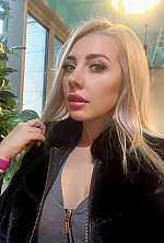 Ukrainian mail order bride Ievgeniia from Poltava with blonde hair and brown eye color - image 33