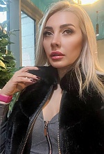 Ukrainian mail order bride Ievgeniia from Poltava with blonde hair and brown eye color - image 32