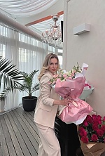 Ukrainian mail order bride Mariam from Chisinau with light brown hair and blue eye color - image 14