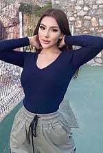 Ukrainian mail order bride Asem from Almaty with black hair and brown eye color - image 8