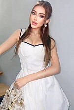 Ukrainian mail order bride Asem from Almaty with black hair and brown eye color - image 2
