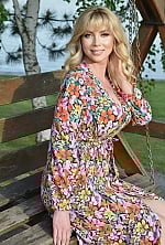 Ukrainian mail order bride Iryna from Kyiv with blonde hair and green eye color - image 5