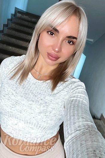 Ukrainian mail order bride Anna from Kyiv with blonde hair and hazel eye color - image 1