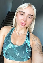Ukrainian mail order bride Anna from Kyiv with blonde hair and hazel eye color - image 5