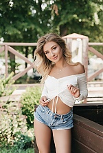 Ukrainian mail order bride Katerina from Ivano-Frankivsk with light brown hair and blue eye color - image 3