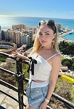 Ukrainian mail order bride Natalia from Athens with light brown hair and green eye color - image 5