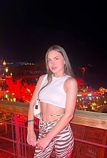 Ukrainian mail order bride Yuliia from Kyiv with brunette hair and green eye color - image 9