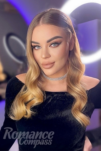 Ukrainian mail order bride Diana from Kyiv with light brown hair and blue eye color - image 1