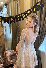 Ukrainian mail order bride Antonina from Paris with blonde hair and green eye color - image 2