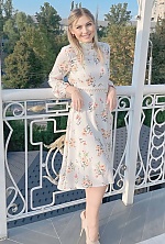 Ukrainian mail order bride Antonina from Paris with blonde hair and green eye color - image 9
