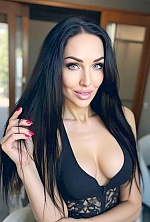 Ukrainian mail order bride Tetyana from Kharkiv with black hair and green eye color - image 2
