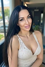 Ukrainian mail order bride Tetyana from Kharkiv with black hair and green eye color - image 3