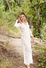 Ukrainian mail order bride Anzhelika from Kyiv with blonde hair and hazel eye color - image 7