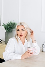 Ukrainian mail order bride Tanya from Kyiv with blonde hair and green eye color - image 3