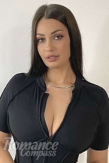 Ukrainian mail order bride Yuliia from Warsaw with brunette hair and brown eye color - image 1