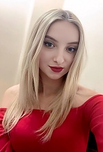 Ukrainian mail order bride Marta from Lviv with blonde hair and blue eye color - image 9