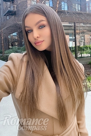 Ukrainian mail order bride Elena from Kyiv with light brown hair and blue eye color - image 1