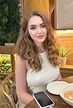 Ukrainian mail order bride Yulia from Lviv with light brown hair and green eye color - image 9
