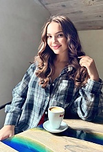 Ukrainian mail order bride Yulia from Lviv with light brown hair and green eye color - image 7