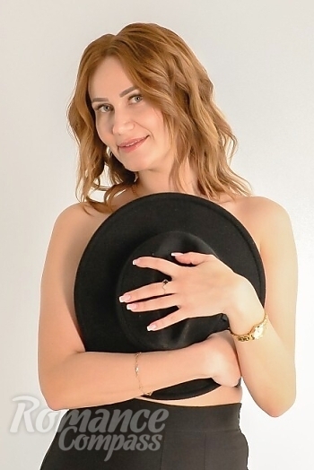 Ukrainian mail order bride Tetiana from Rivne with light brown hair and green eye color - image 1