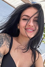Ukrainian mail order bride Anastasiia from Ivano-Frankivsk with brunette hair and green eye color - image 4