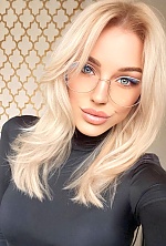 Ukrainian mail order bride Kateryna from Kyiv with blonde hair and blue eye color - image 4