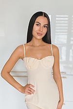 Ukrainian mail order bride Anna from Kyiv with black hair and green eye color - image 7