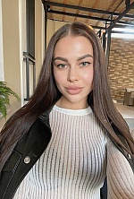 Ukrainian mail order bride Anna from Kyiv with black hair and green eye color - image 2