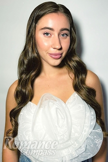 Ukrainian mail order bride Viktoriia from Kyiv with light brown hair and green eye color - image 1