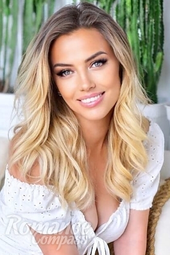Ukrainian mail order bride Tatiana from Kyiv with blonde hair and grey eye color - image 1