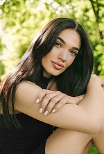 Ukrainian mail order bride Olga from Kyiv with black hair and green eye color - image 3