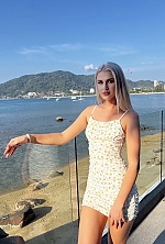 Ukrainian mail order bride Karina from Almaty with blonde hair and green eye color - image 2