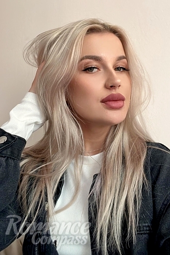 Ukrainian mail order bride Karina from Almaty with blonde hair and green eye color - image 1