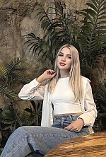 Ukrainian mail order bride Karina from Almaty with blonde hair and green eye color - image 3