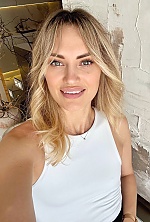 Ukrainian mail order bride Tetiana from Kyiv with blonde hair and blue eye color - image 10
