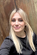 Ukrainian mail order bride Tetiana from Kyiv with blonde hair and blue eye color - image 18